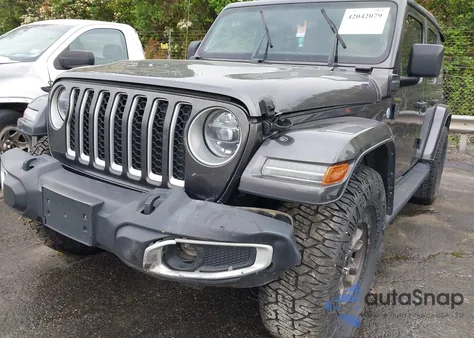 2021 Jeep Wrangler 4Xe Unlimited Sahara 4X4 from USA, damaged, VIN 1C4JJXP60MW704738